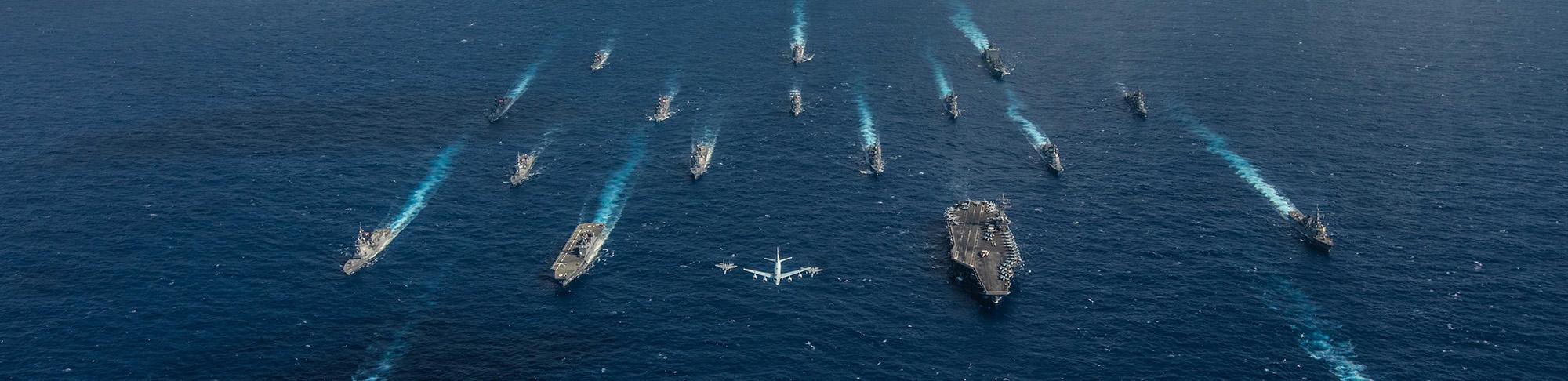 Battle group of Naval ships and planes
